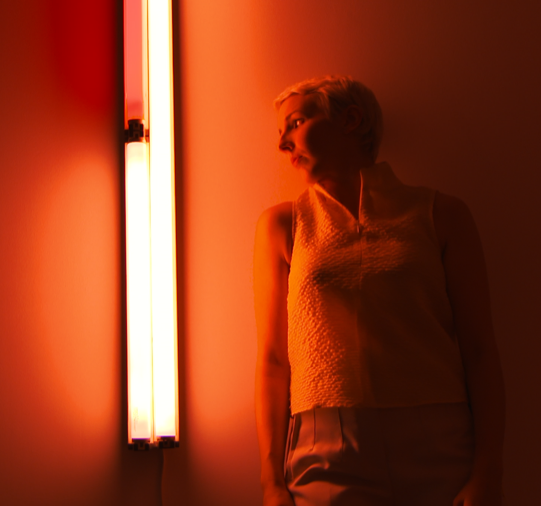 Megan Griffiths performs at BASTIAN Gallery in response to exhibition of Dan Flavin's work