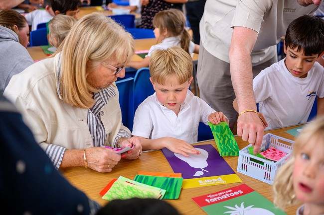 Children sharing their art skills with their families as part of the SEED schools project pilot; photograph by David Monteith Hodge, Photographise
