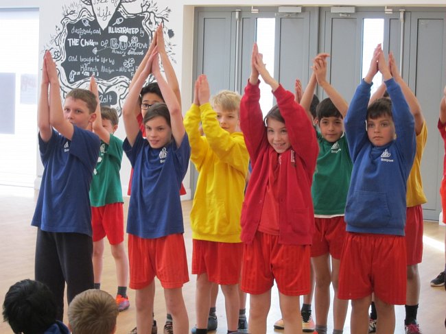 Photo Emma McFarland; children rehearsing for Tudor-themed performance