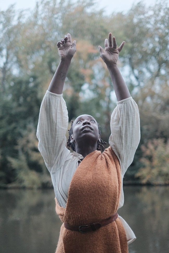 Gathering Place 360 at Runnymede Pleasure Grounds, performer Amarnah Ufuoma Cleopatra, photographer Matt Walker (Cave and Sky)